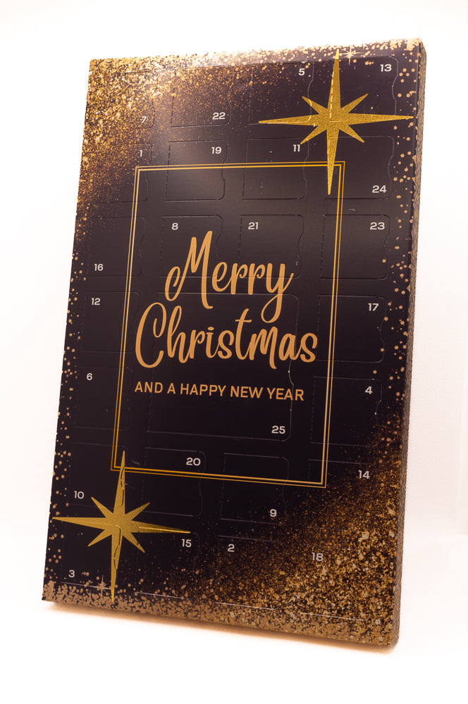 Merry Christmas Design and the text Magical Christmas across the soy, vegan and cruelty free wand a Happy New Year wax melt advent calendar, purple with gold star on the box and luxury melts within.