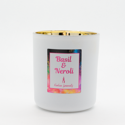 White candle, with gold inner, cotton wick and in Basil & Neroli fragrance. 