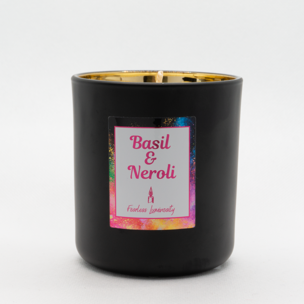 Black outer Candle with gold reflective inner candle and Basil & Neroli. Cotton Wick. 