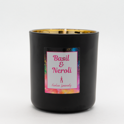 Black outer Candle with gold reflective inner candle and Basil & Neroli. Cotton Wick. 