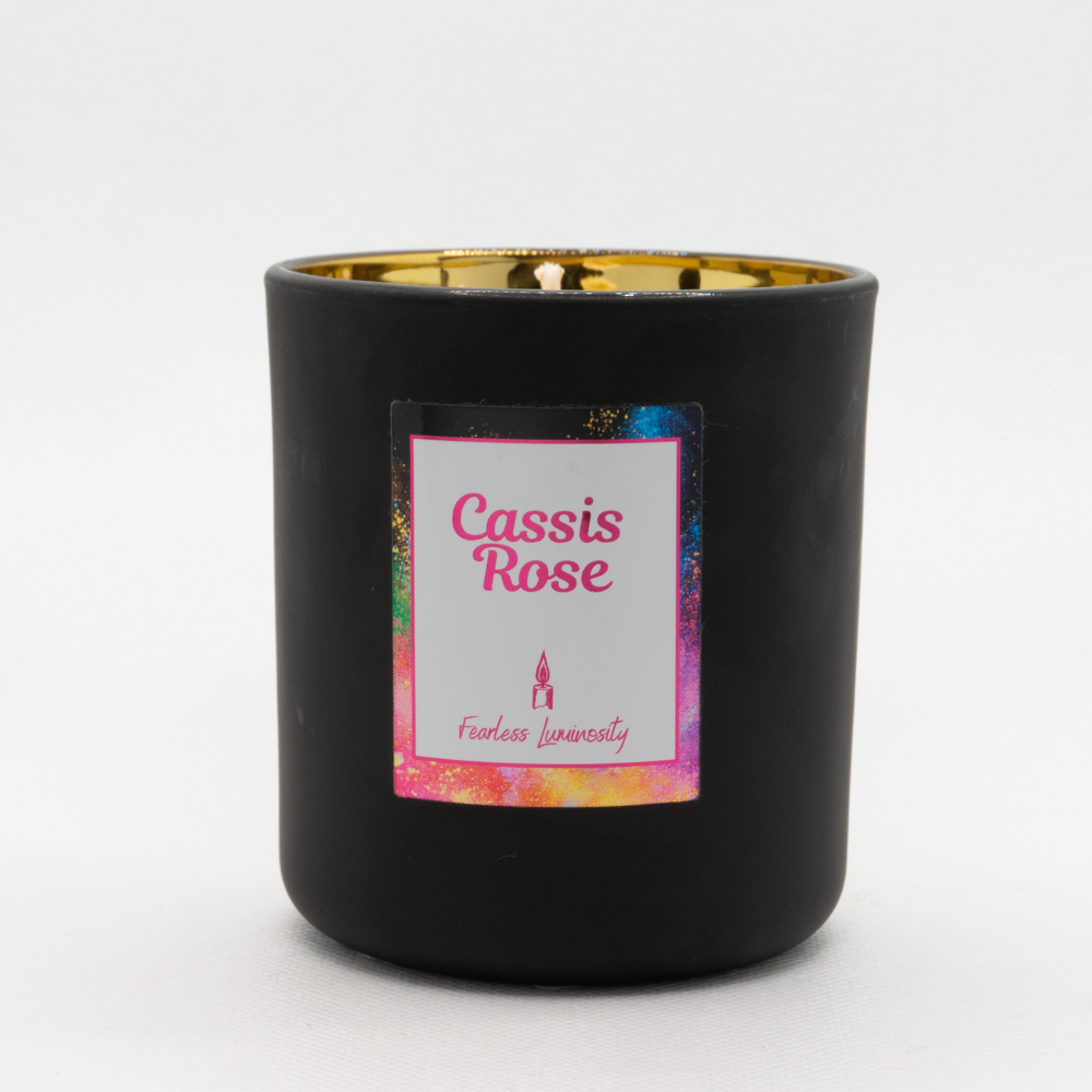 Black outer Candle with gold reflective inner candle and Cassis Rose. Cotton Wick. 