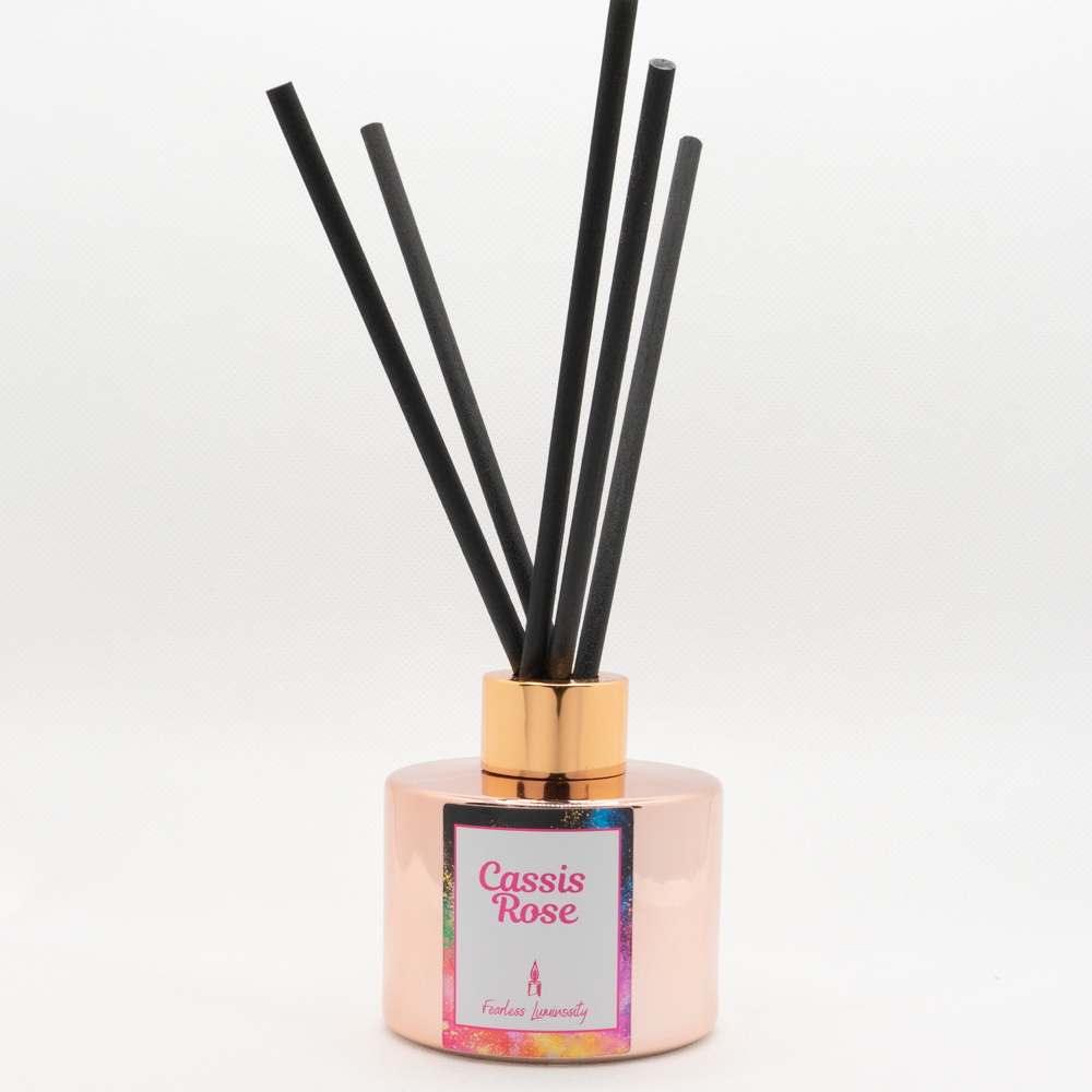 Rose Gold Cassis Rose Diffuser with black reeds. 