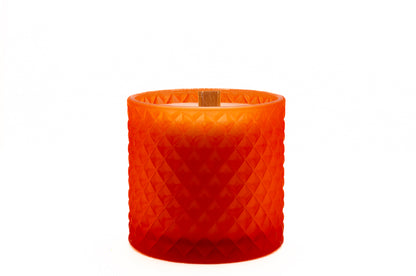 Wooden wick showing with the lid removed from the candle, matt orange colour, bold and beautiful. 
