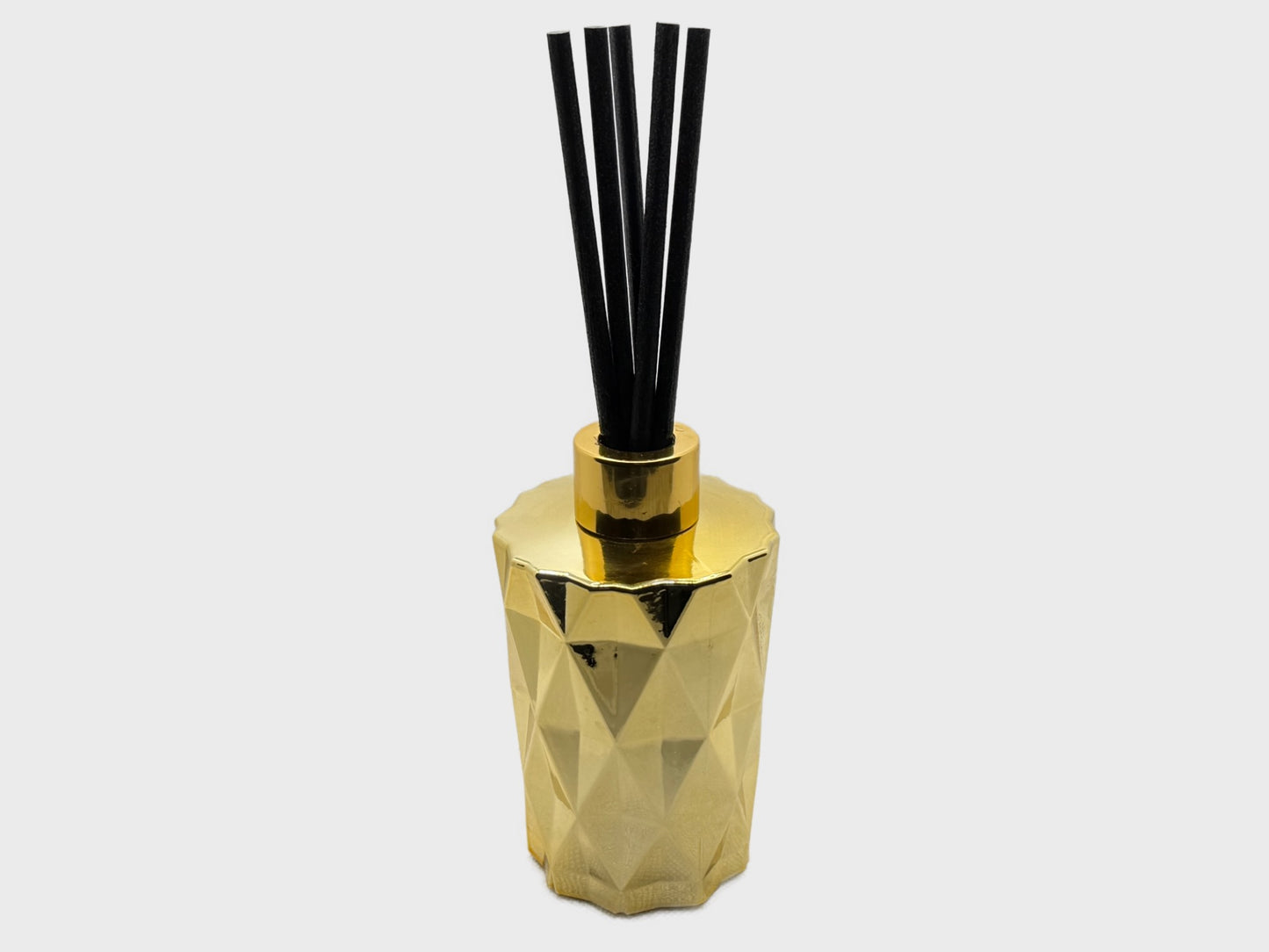 Our 200ml Gold art deco style diffuser with black reeds in our stunning Spiced Orange Fragrance, perfect for Christmas 