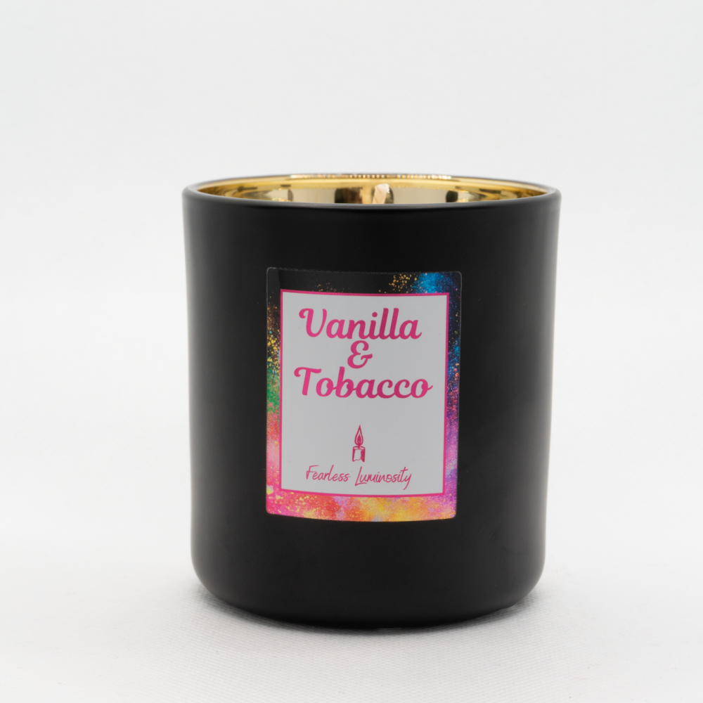 Black outer Candle with gold reflective inner candle and Vanilla & Tobacco. Cotton Wick. 