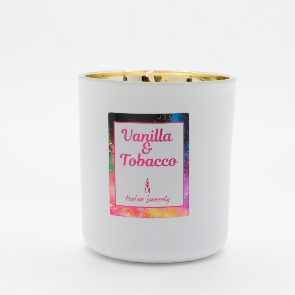 White candle, with gold inner, cotton wick and in Vanilla & Tobacco fragrance. 
