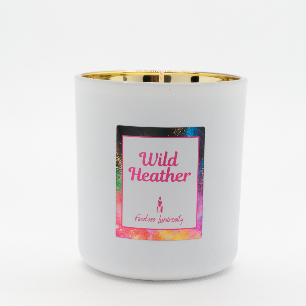 White candle, with gold inner, cotton wick and in Wild Heather fragrance. 