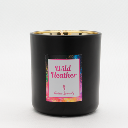 Black outer Candle with gold reflective inner candle and Wild Heather. Cotton Wick. 