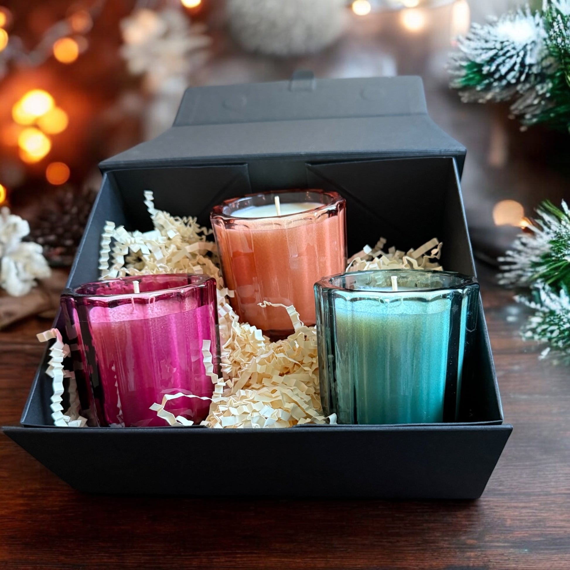 Blue, pink and peach luxury mini candle gift set, in beautiful bright vessels. These 3 candles come in a gorgeous black gift box as a set or individually.  Candle fragrances are spiced orange, frosted spice and ylang and cinnamon and saffron. Perfect festive candle gift set 