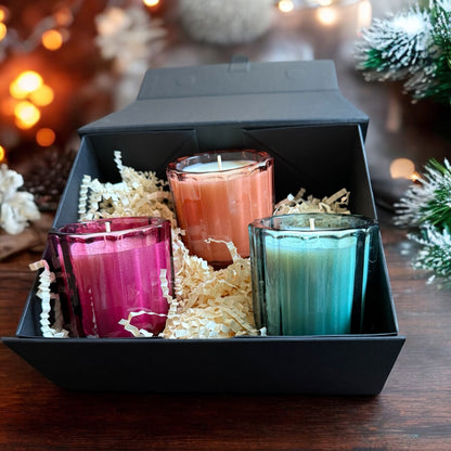Blue, pink and peach luxury mini candle gift set, in beautiful bright vessels. These 3 candles come in a gorgeous black gift box as a set or individually.  Candle fragrances are spiced orange, frosted spice and ylang and cinnamon and saffron. Perfect festive candle gift set 